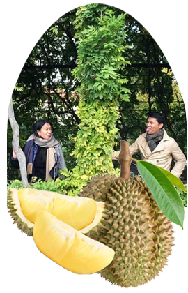 Durian fruit with a couple exchanging playful tongue-out gestures in the background